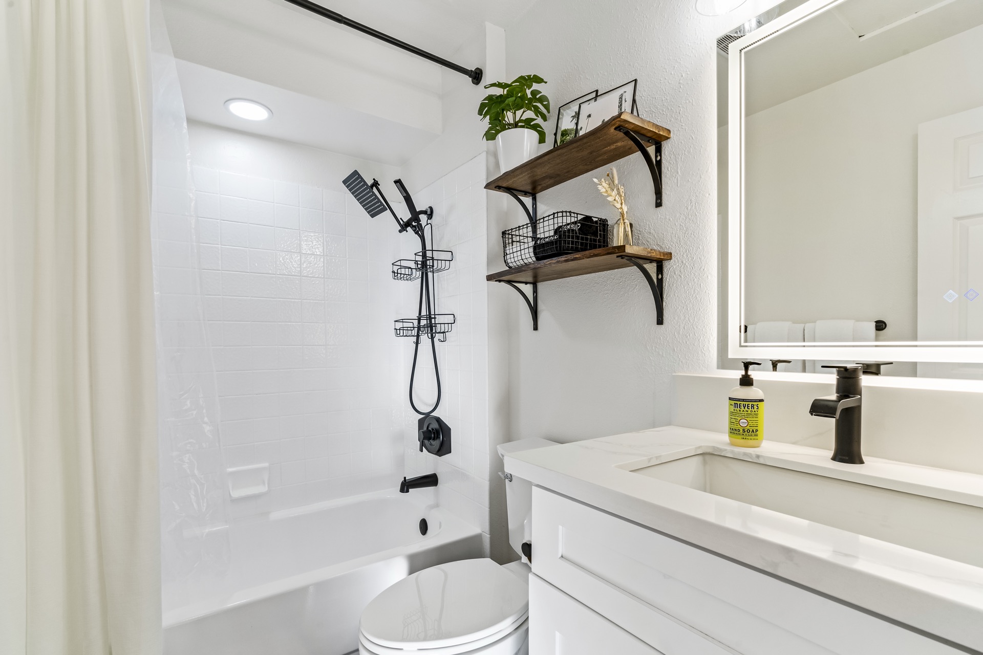 Sleek bathroom with LED mirror